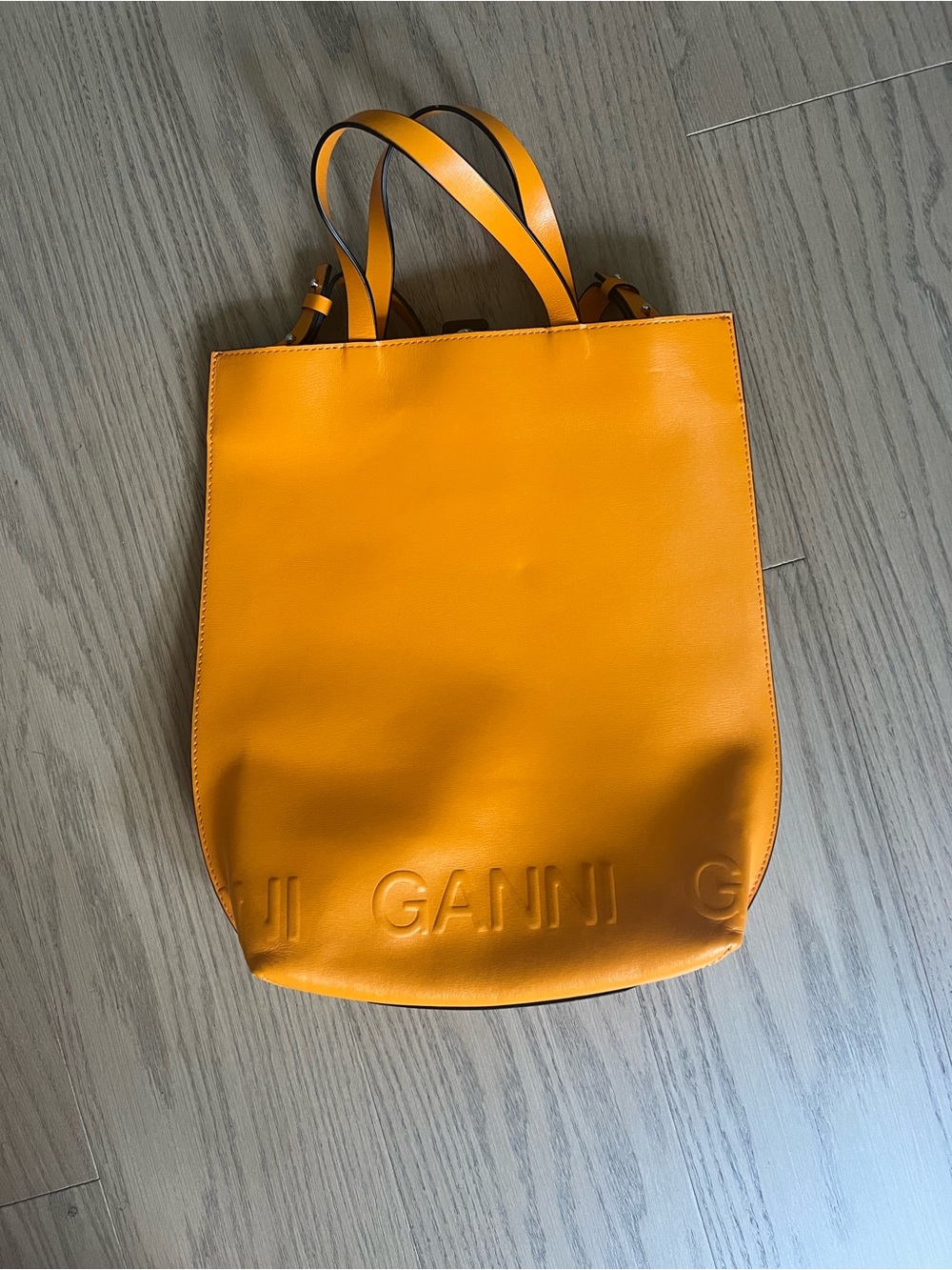 Ganni embossed logo leather tote bag